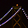 San Francisco and the Bay Bridge all lite up.